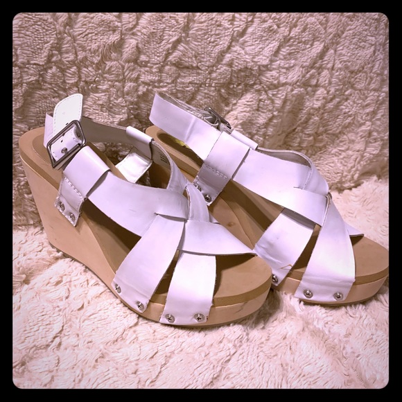 white volatile sandals